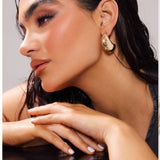 NWT Pretty Little Thing gold curved drop earrings